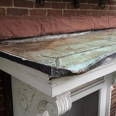 Crown molding damage to copper roof