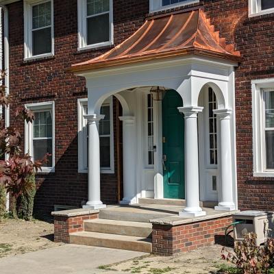 Copper Roof Entry by Kevin Hazlett & Tiernan King Structure built by Woodland Design Co., LLC